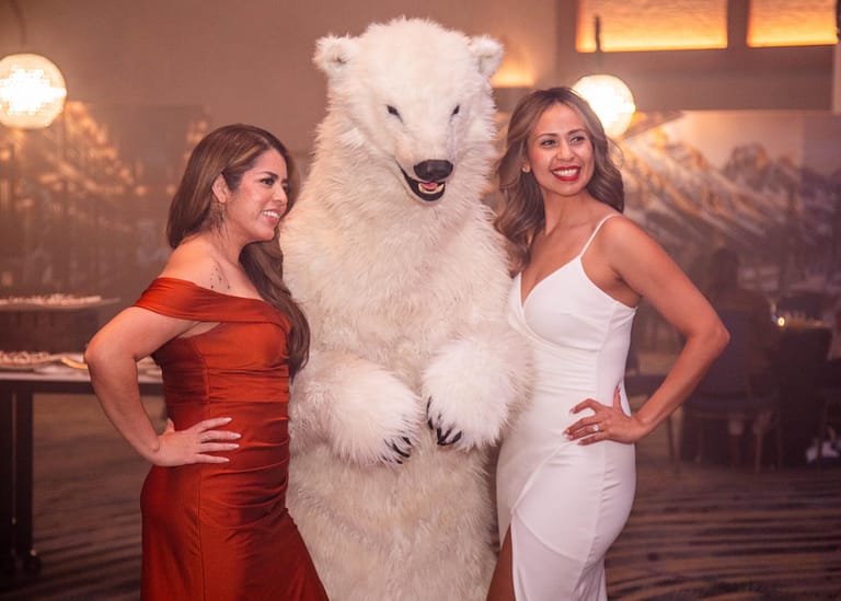 Frostbite playfully interacting with guests at the Gaylord Rockies